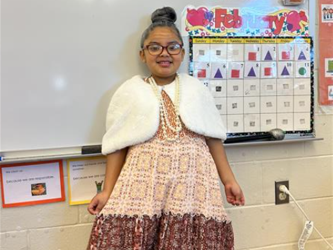 Students pose on the 100th day of school