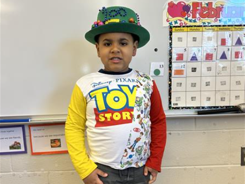 Students pose on the 100th day of school